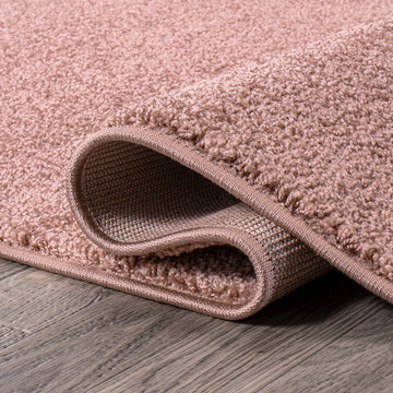 Haze Solid Low-pile Area Rug Pink